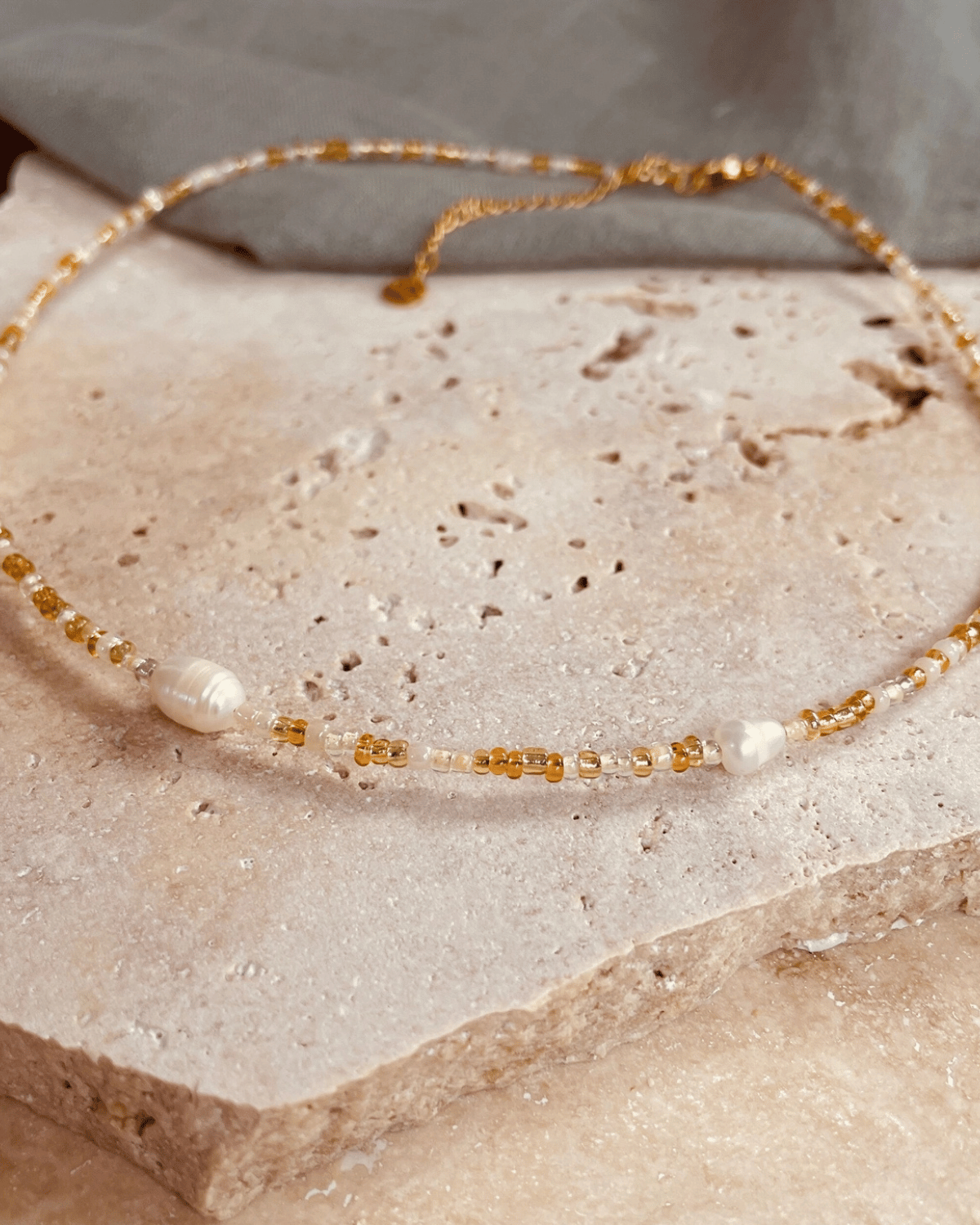 Luna.Foundling ❘ Beaded Necklace - Exhale Pebbly Beach (Adult)