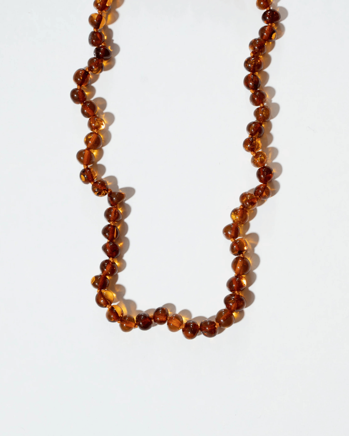 Caramel - Baltic Amber Teething Necklace by Nirrimis