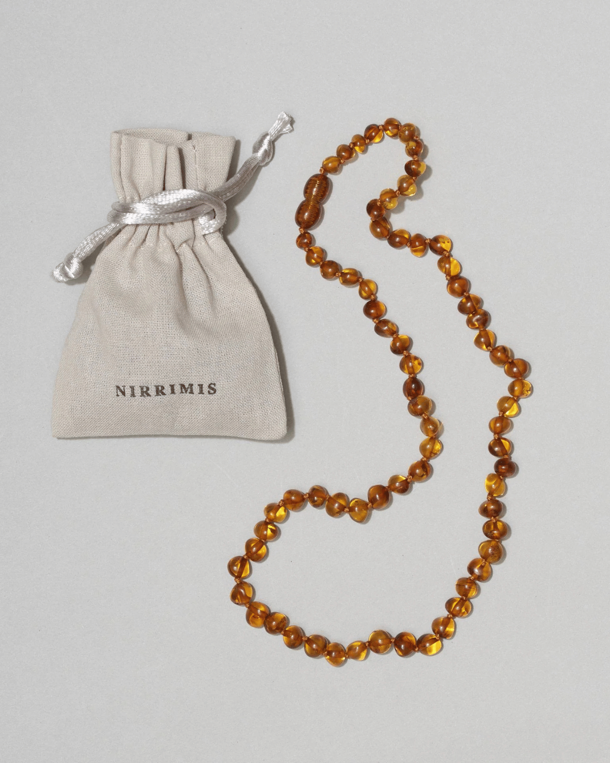 Caramel - Baltic Amber Teething Necklace by Nirrimis