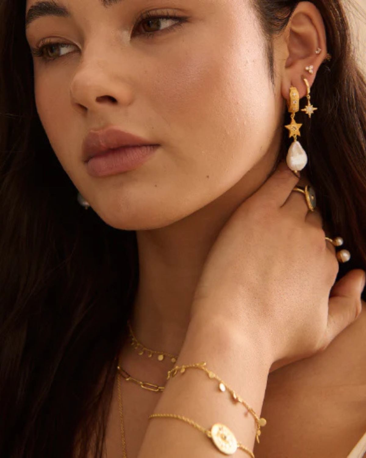 Cosmic Love Long Star Gold Earring With Pearl by Murkani