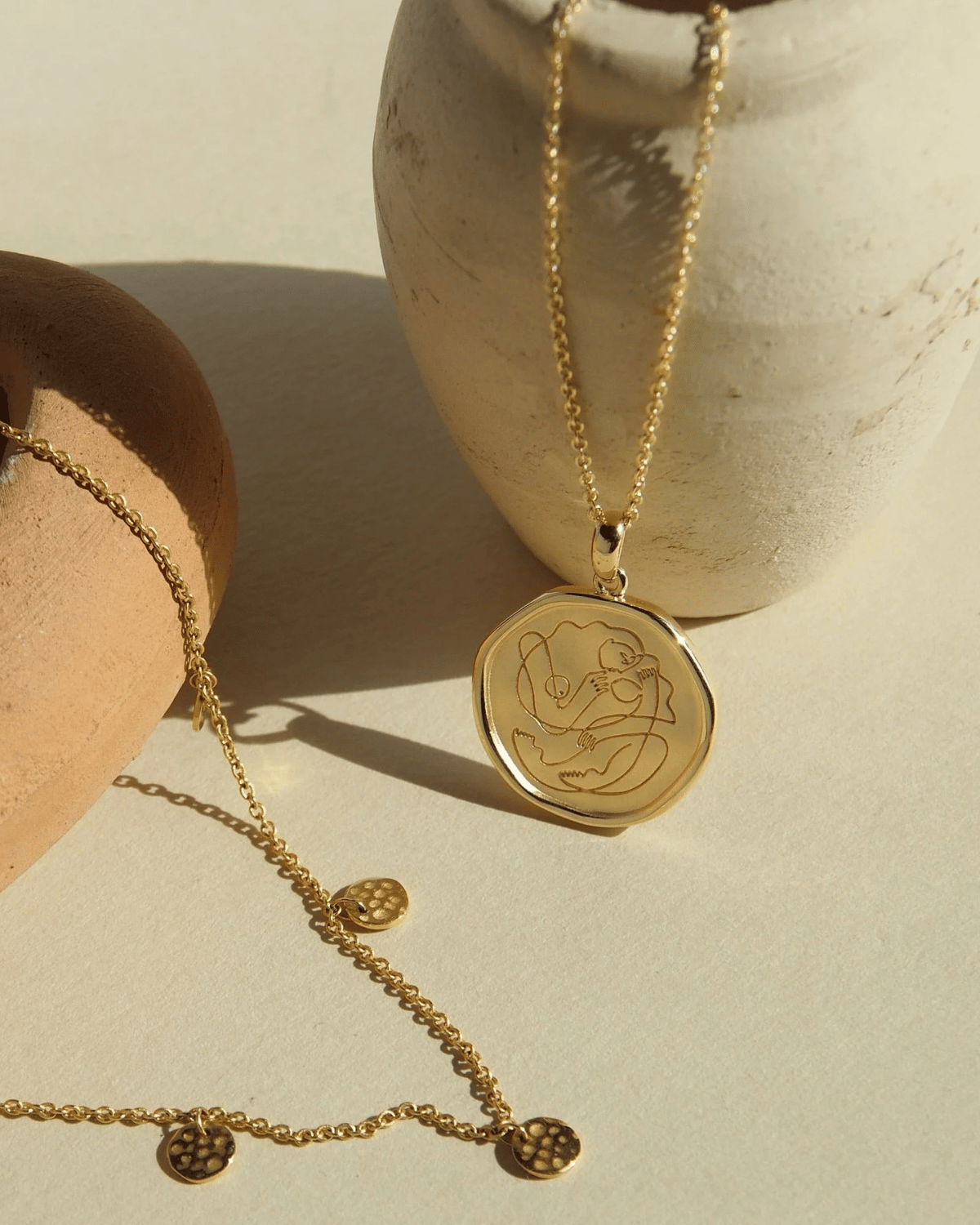 Motherhood Necklace in Gold by Murkani