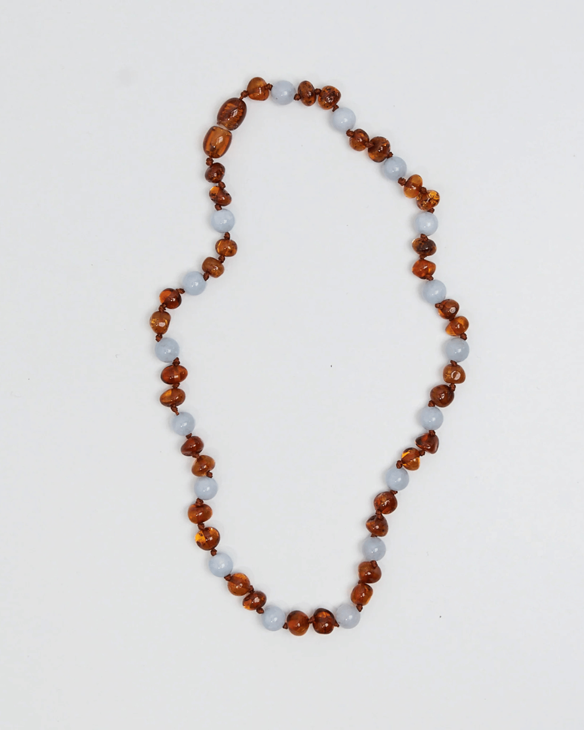 Regn - Baltic Amber Teething Necklace by Nirrimis
