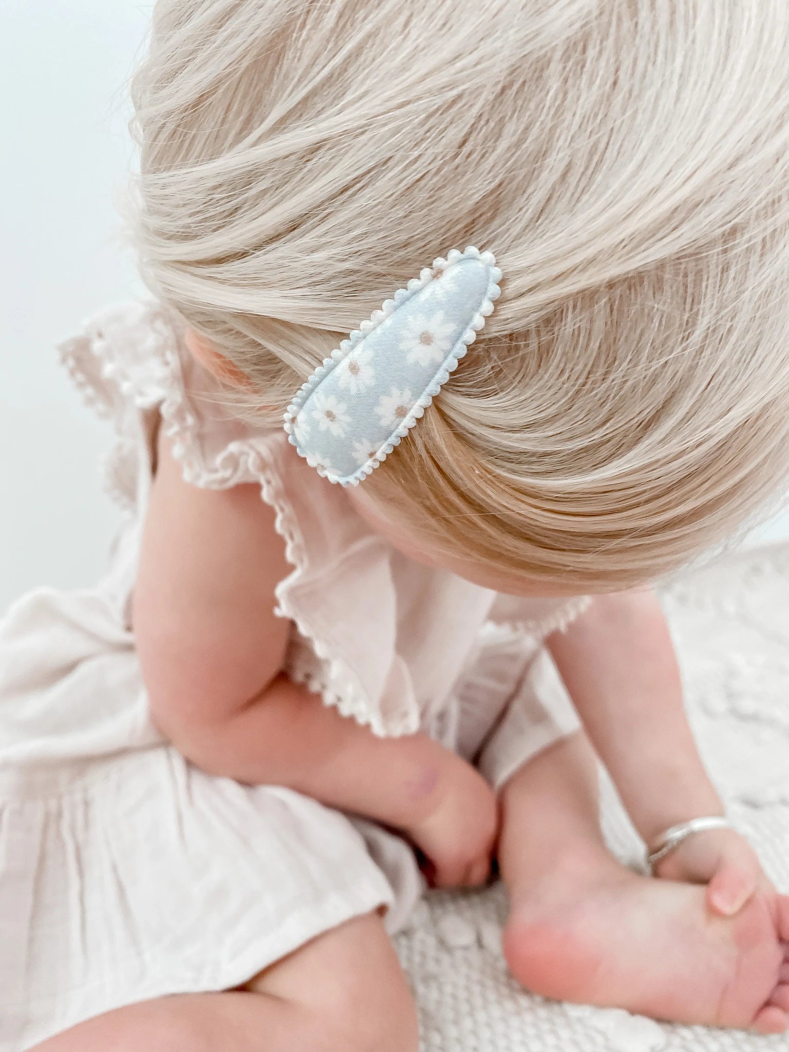 pretty blue floral daisy fabric hair clips in kids hair