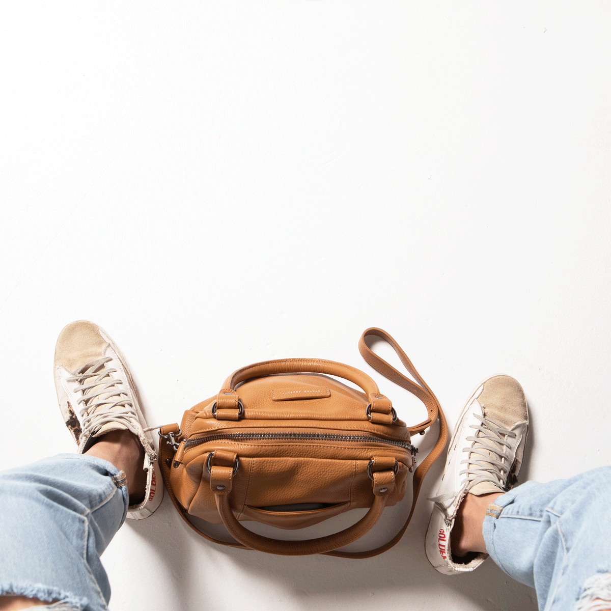 status anxiety last mountains leather handbag in tan