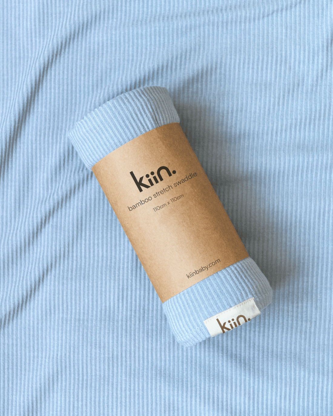 Bamboo Stretch Swaddle by Kiin Baby in Pastel Sky