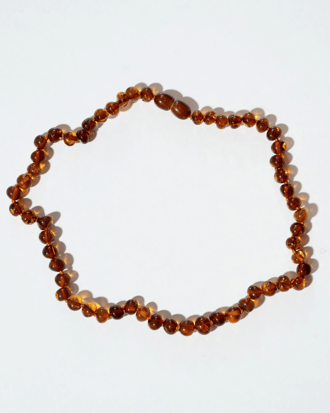 Caramel - Baltic Amber Teething Necklace by Nirrimis