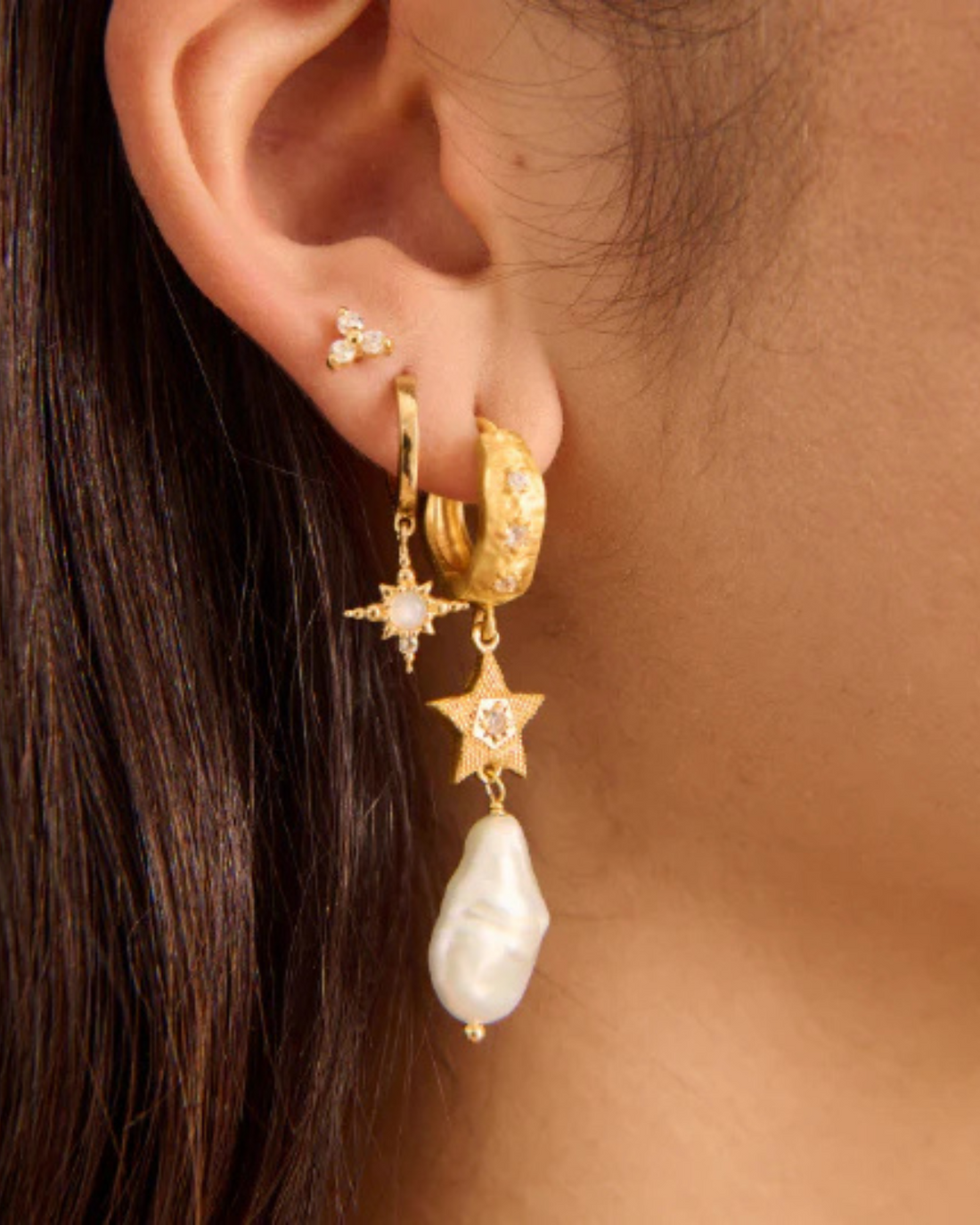 Cosmic Love Long Star Gold Earring With Pearl by Murkani