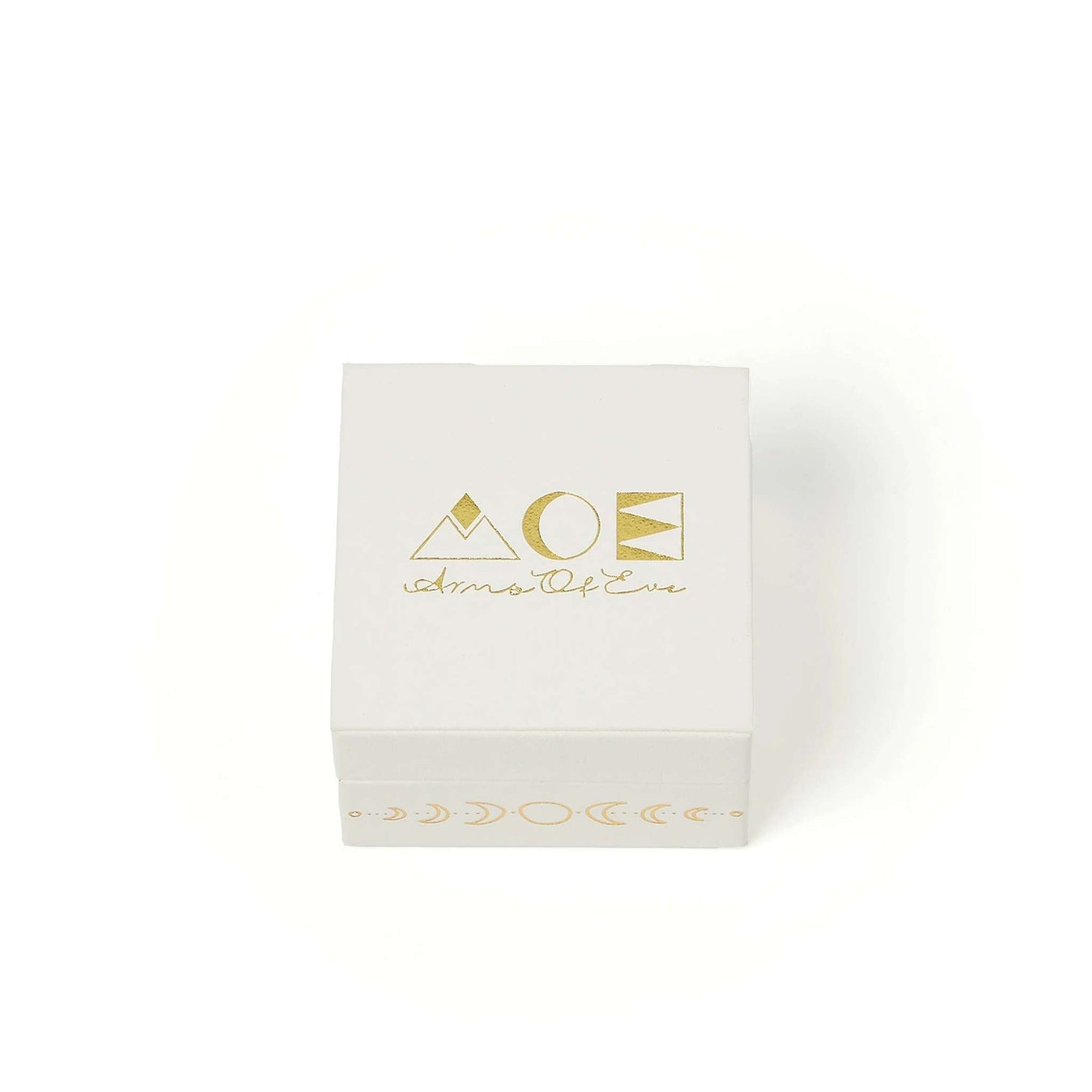 white jewellery box with gold foil logo for arms of eve