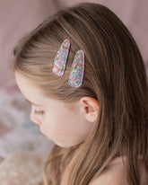 kids pretty floral hair clips in hair