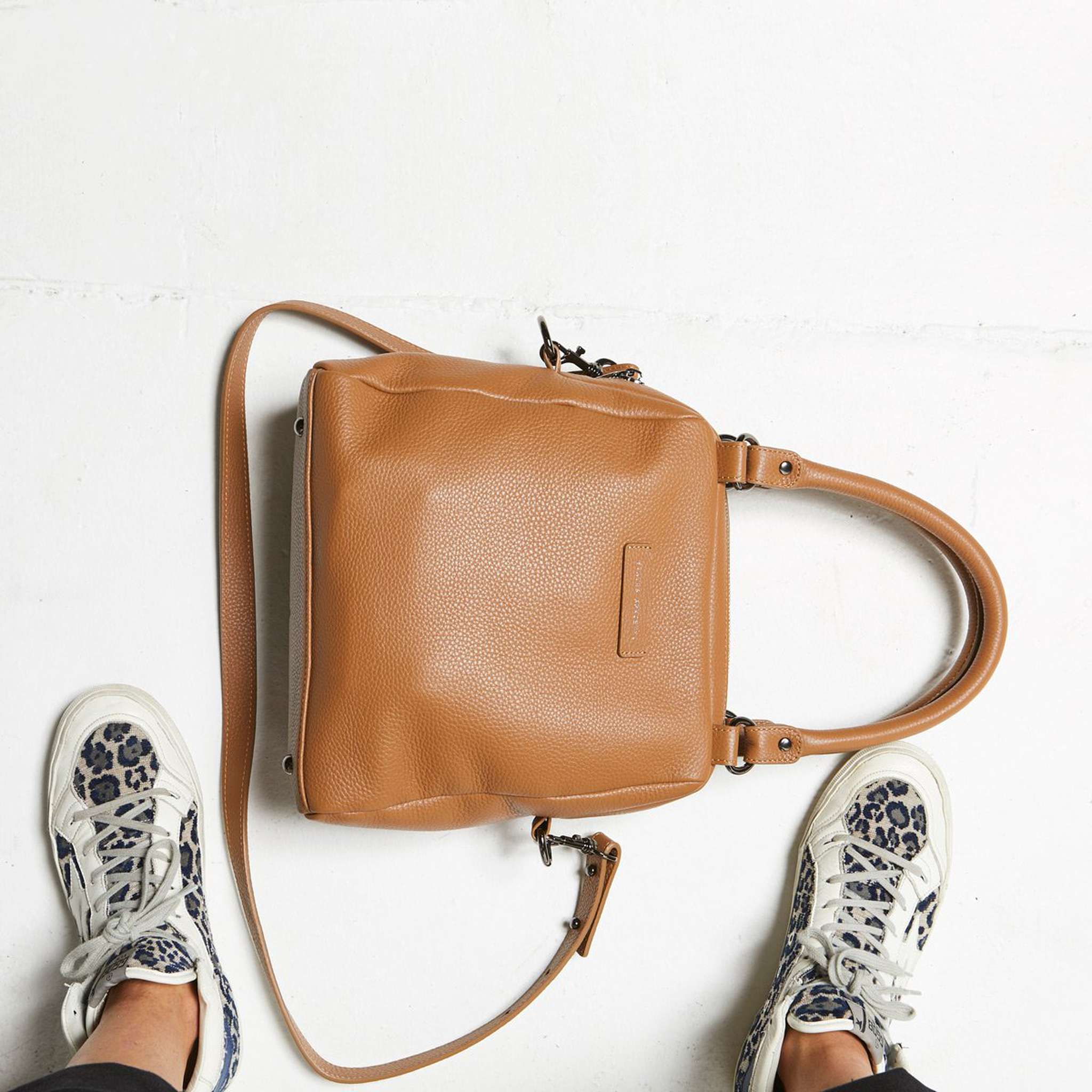 status anxiety last mountains leather handbag in tan