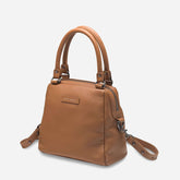 status anxiety last mountains leather handbag in tan side view