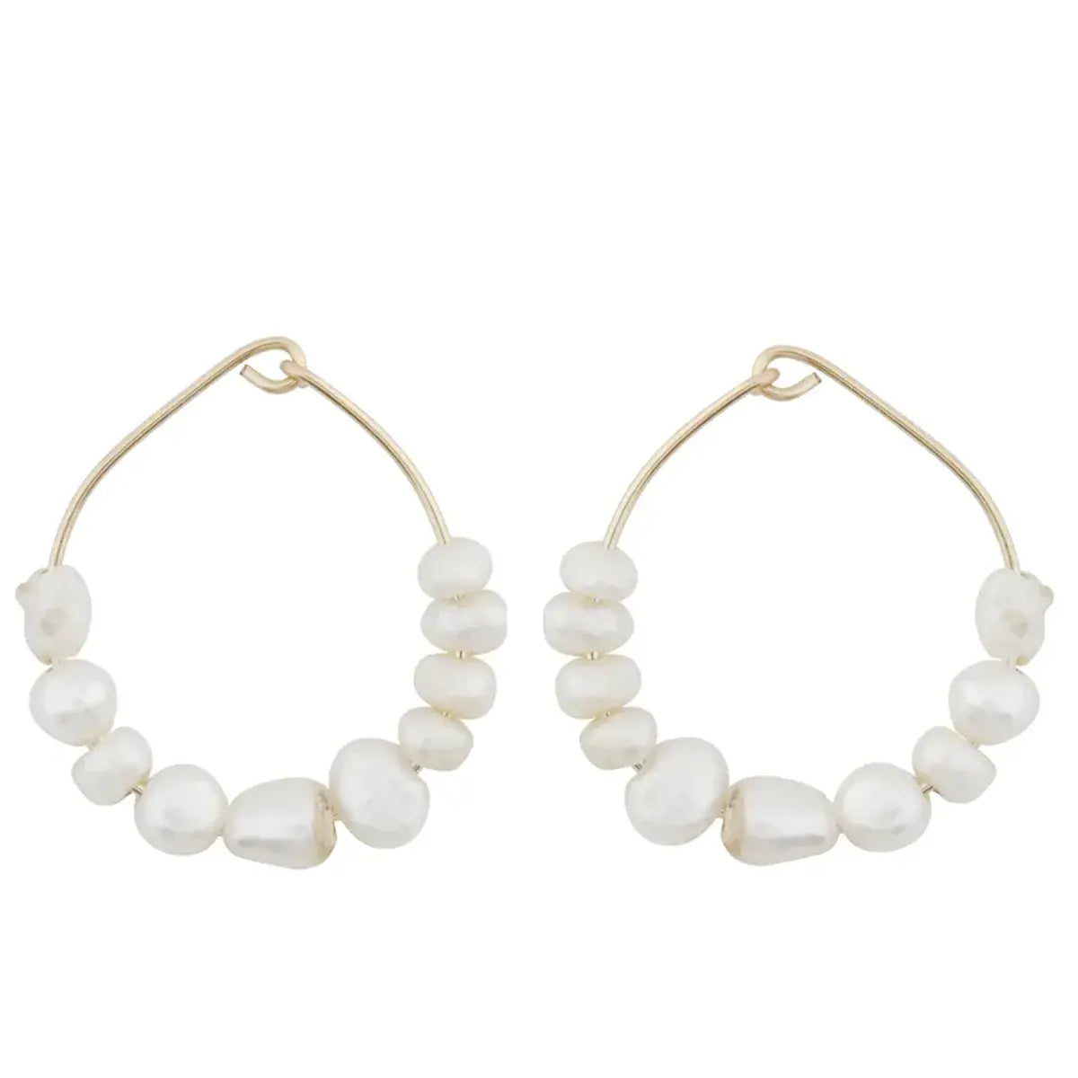 The Venus Pearl Hoops Earrings by Made by a. in Sold Gold 