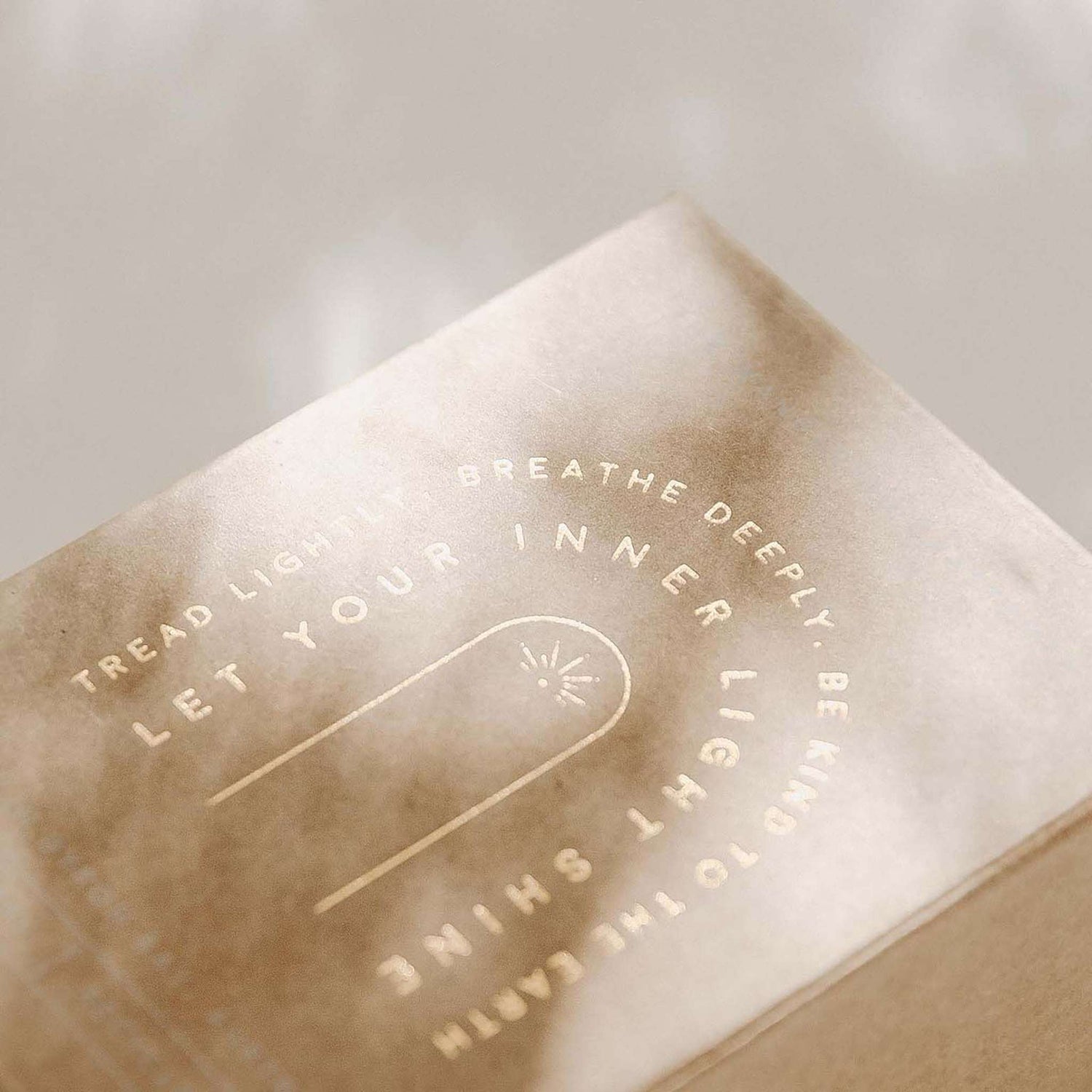 soy wax candle in gift box with gold writing